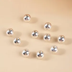 High-shine S925 sterling silver round beads for DIY jewelry making and necklaces.
