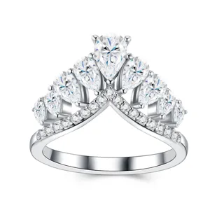 Close-up detail showing the intricate pear-shaped stones and V-shaped setting of the ring