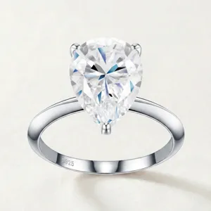 S925 sterling silver solitaire ring with a sparkling pear-shaped moissanite gemstone.