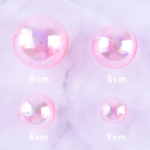 Pink iridescent bubble ball cake topper set, translucent decorative sphere for party baking.