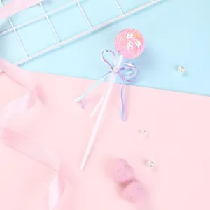 Bonito adorno de pastel con bola de lentejuelas rosa con cinta para postre de fiesta