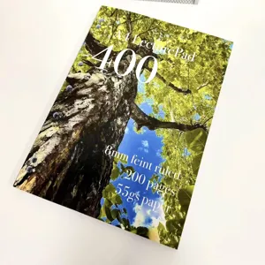 Detailed view of the A4 lecture notebook featuring a scenic tree photo cover design.