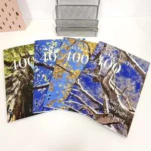 A4 nature landscape student notebook set detail showing seasonal tree covers and 200 ruled pages.