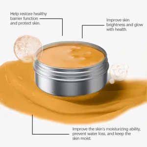 Crème hydratante visage et corps en pot métallique avec formule nourrissante pour la peau.