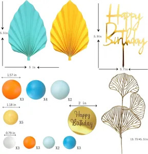 Details of bohemian cake topper set, featuring paper fans, golden ginkgo and colored balls.