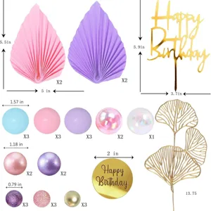 Bohemian cake topper set with paper fan leaves, colorful balls, and gold ginkgo leaves.