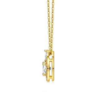 Dettaglio profilo di una collana con ciondolo cuore danzante in argento ed oro.