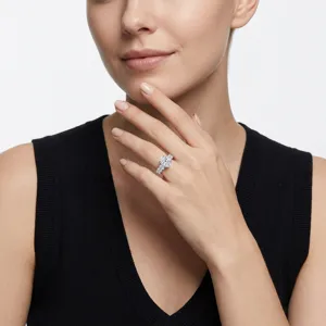 Detailed view of a sparkling S925 silver oval cut engagement ring worn on a female hand