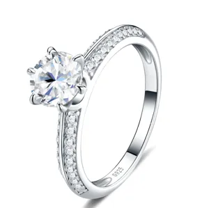 S925 sterling silver ring with 1 carat round moissanite and pavé set side stones