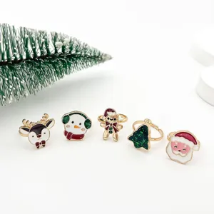 Set mit niedlichen Weihnachtsringen für Kinder, Schneemann- und Rentier-Motiv-Design