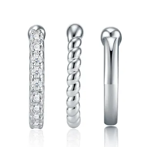 Three silver S925 moissanite ear clips featuring twisted, smooth, and pave-set textures.