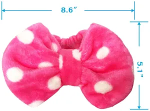 Detailed view of the pink and white polka dot plush bow makeup headband, soft flannel.