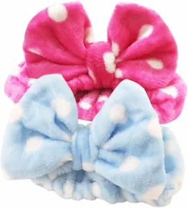 Cute plush polka dot bow headband for washing face and makeup, soft flannel material detail.