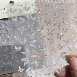 Holographic butterfly nail art stickers, shell shimmering design, elegant manicure decal.