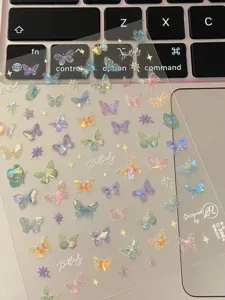 Autocollants d'ongles papillon holographiques transparents brillants pour nail art.