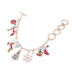 Detail shot of Christmas charm bracelet with snowflake, tree, and stocking pendants