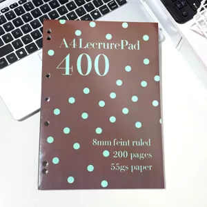 Detailed view of brown A4 refillable notebook with cyan polka dots and lined paper specs.
