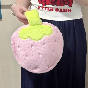 Adorable pink plush strawberry shaped cosmetic storage bag for travel and daily organization