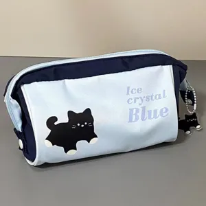 Detailed view of the cute black cat print light blue canvas pencil case with zipper closure.