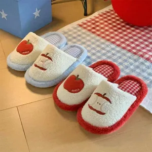 Cute plush cotton slippers with red apple design and cozy checkered lining for winter warmth.