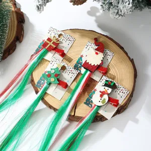 Detail view of festive Christmas hair clips with colorful synthetic hair extensions.