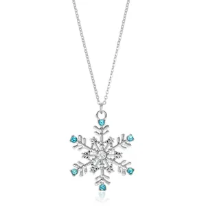 Close-up detail of silver snowflake pendant with sparkling blue rhinestones