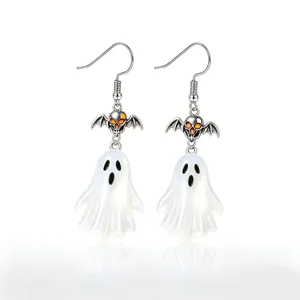 Detailed view of vintage Halloween earrings with bat skull and white ghost pendant