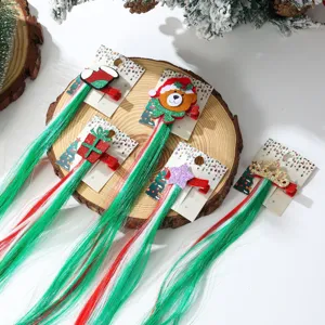 Christmas hair clips with red and green hair extensions for kids' festive hairstyles