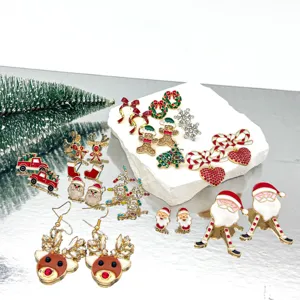 Collection of festive Christmas earrings including Santa Claus, reindeer, and trees