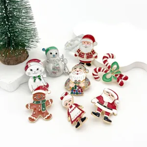 Group of festive Christmas enamel brooches featuring Santa and seasonal motifs