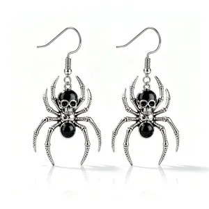 Vintage Halloween silver spider drop earrings featuring black skull and bead details