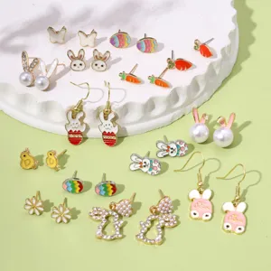 Detailed collection of Easter-themed enamel earrings with rabbit, egg and carrot designs