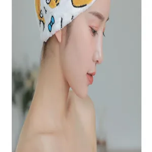 Soft coral fleece dry hair cap with cute cartoon embroidery for fast water absorption and drying.
