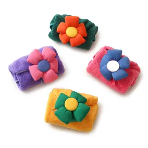 Cute hanging coral fleece hand towel with cartoon flower design, highly absorbent detail.