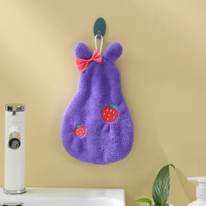 Cute hanging coral fleece hand towel with bunny ears, bow, and strawberry embroidery for kitchen.
