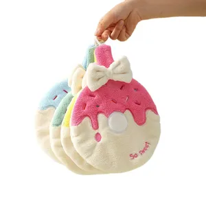 Soft donut-shaped coral fleece hand towel with cute bow decoration and hangable loop