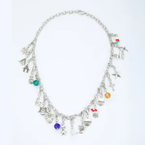 Festive silver Christmas advent charm necklace featuring reindeer and snowflake pendants