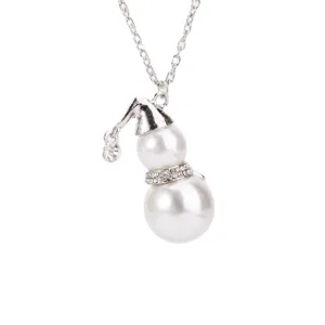 Cute Christmas snowman pendant necklace with white pearls and sparkling rhinestones