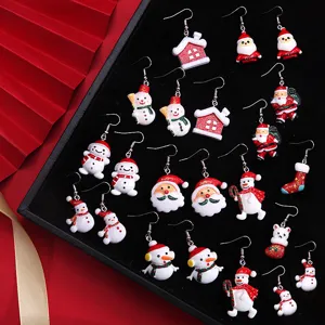 Assorted cute resin Christmas earrings with Santa Claus and snowman motifs on black tray