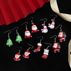 Detailed view of colorful resin Christmas earrings featuring cute cartoon charms like Santa