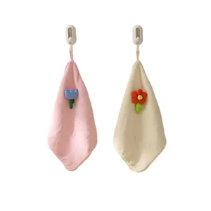 Soft absorbent coral fleece hand towels with 3D tulip and flower decorations on hooks