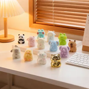 A diverse collection of mini cute animal figurines in praying pose for desk decor
