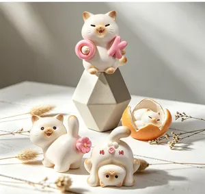 Set of four cute cat blind box figurines in various poses on a white wood table.