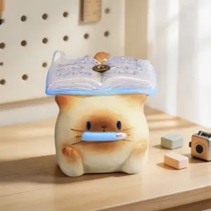 Adorable figurine de brûleur d'encens chat siamois avec design de livre ouvert sur bureau