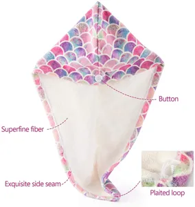 Microfiber hair drying towel with mermaid scale print, button, and plaited loop design.
