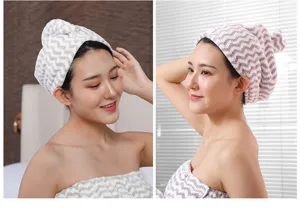 Soft coral fleece dry hair cap with absorbent quick-dry design, ideal for daily hair care routines.