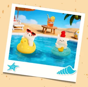 Detailed shot of cute white dog figurines floating in a miniature swimming pool scene.
