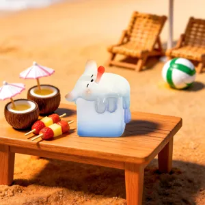 Cute Dog PAi figurine on ice cube, creative miniature beach scene desk decoration.