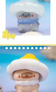 Macro shot of two cute mushroom elf mini resin figurines with colorful hats and details