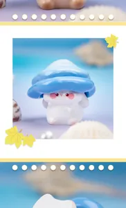 Detailed view of a cute resin mushroom elf figurine in a seashell themed scene.